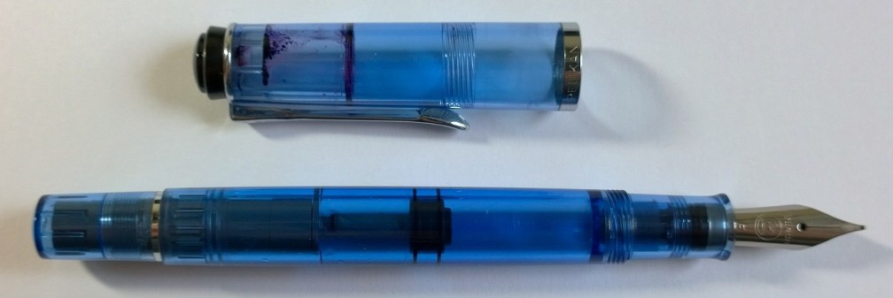 As you can see, Pelikan employs a "cap within a cap" design which, on the demonstrators, clearly shows how easily ink can get trapped between the layers. The piston is clearly visible within the barrel of the fountain pen as well!